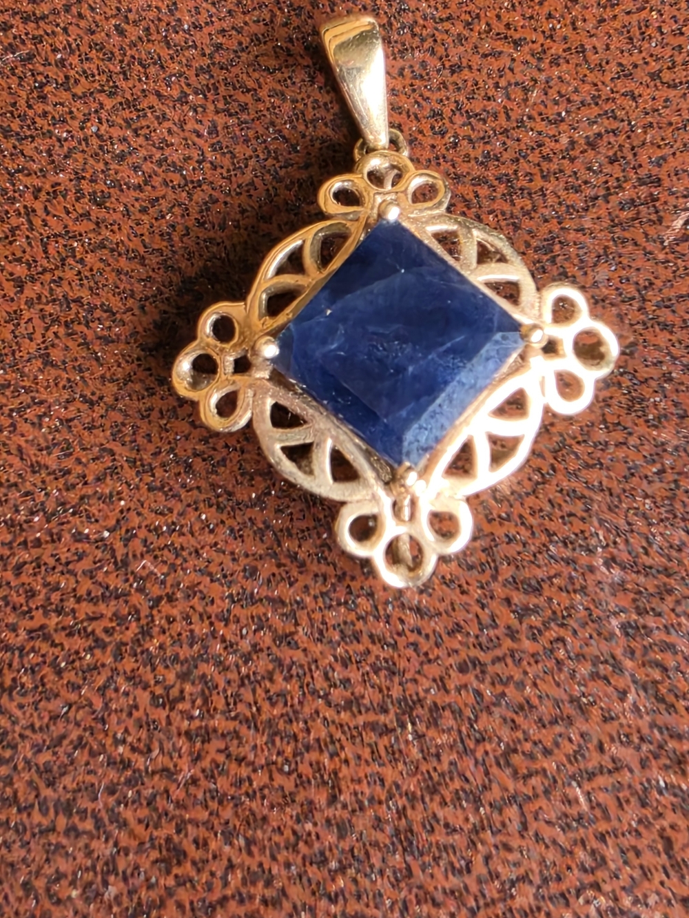 10k gold sapphire pendant. Stamped 10k. Beautiful gold work! See all pics to inc